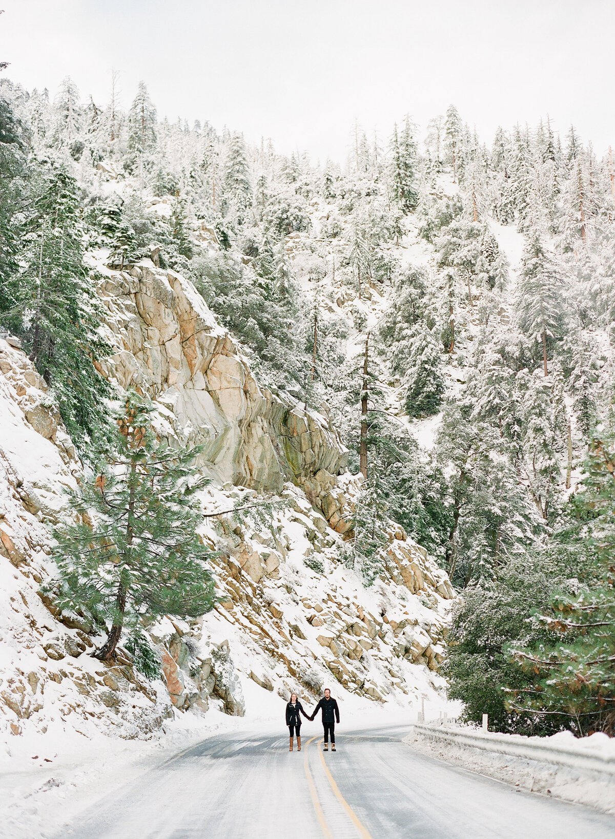 Couple in a snow-covered forest
