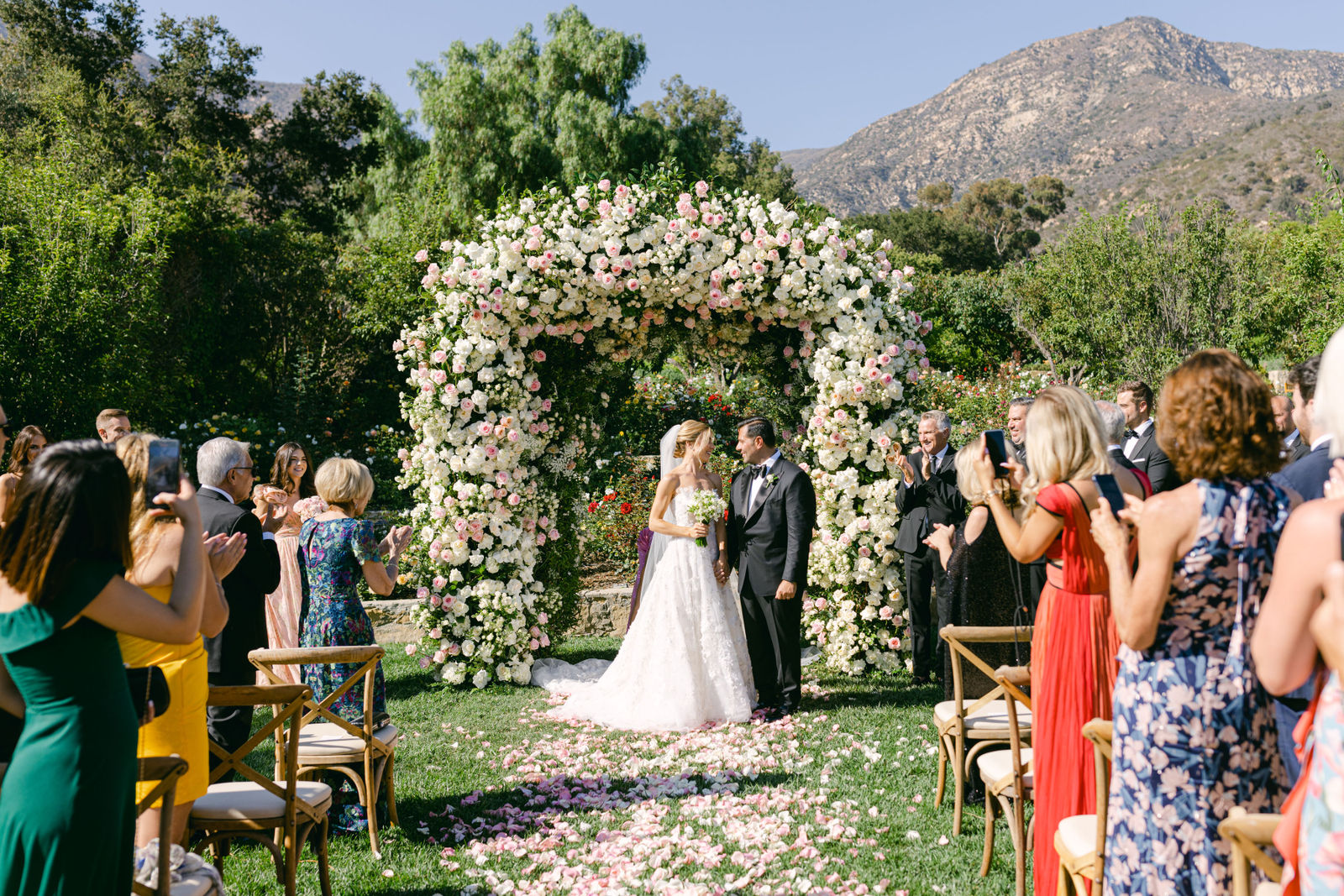 The ceremony in the round, petals underfoot